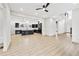 Bright and airy living room with a view of the modern kitchen, offering an open and inviting space at 2402 Lynn Iris Dr, Decatur, GA 30032