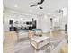 Elegant living room seamlessly connected to the kitchen, showcasing the home's modern, open design at 2402 Lynn Iris Dr, Decatur, GA 30032