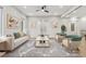 Comfortable living room with stylish furnishings, wood flooring, and a view of the open-concept layout at 2402 Lynn Iris Dr, Decatur, GA 30032