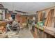 Unfinished basement needs clearing, featuring concrete walls, exposed pipes, and a drop ceiling at 2807 Knollview Dr, Decatur, GA 30034