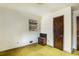 Small bedroom with a window and closet, featuring light walls and green carpet in need of refurbishment at 2807 Knollview Dr, Decatur, GA 30034