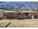 Charming single-story brick home with a cozy front porch and a convenient wheelchair ramp at 2807 Knollview Dr, Decatur, GA 30034