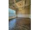 Elegant dining room with coffered ceilings, wainscoting, and a modern chandelier at 3592 Hancock Vw, Decatur, GA 30034