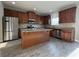 Charming kitchen with granite countertops, wood cabinetry, and stainless steel appliances at 3592 Hancock Vw, Decatur, GA 30034