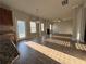 Bright, open concept living and kitchen area with hardwood floors, a fireplace and natural light at 3592 Hancock Vw, Decatur, GA 30034