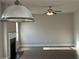Bright living room features a fireplace, ceiling fan and neutral paint at 3592 Hancock Vw, Decatur, GA 30034
