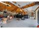 View of the garage, with a vehicle, storage, and equipment, showing ample workspace at 130 Plantation Dr, Stockbridge, GA 30281