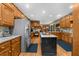 Well-equipped kitchen featuring granite countertops, stainless steel appliances, and hardwood floors at 130 Plantation Dr, Stockbridge, GA 30281