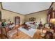 Inviting living room featuring hardwood floors, neutral paint, and plush white rug at 130 Plantation Dr, Stockbridge, GA 30281