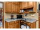 Dedicated desk space featuring granite countertops, oak cabinets and natural lighting at 130 Plantation Dr, Stockbridge, GA 30281
