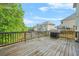 Spacious wooden back deck with grill perfect for entertaining and enjoying the outdoors at 15 Manas Ct, Covington, GA 30016
