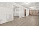 Partially renovated basement with modern floors at 15 Manas Ct, Covington, GA 30016