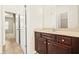 Bathroom view featuring a dark wood vanity with a light countertop at 15 Manas Ct, Covington, GA 30016