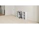 Bedroom featuring a desk with shelving and a comfortable chair at 15 Manas Ct, Covington, GA 30016