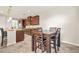 Cozy kitchen and dining nook with an exterior door at 15 Manas Ct, Covington, GA 30016