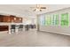 Eat in kitchen with dark wood cabinetry and stainless steel appliances at 15 Manas Ct, Covington, GA 30016