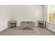 Bright home office with modern desk, ample natural light, and neutral decor at 15 Manas Ct, Covington, GA 30016