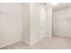 Spacious walk-in closet featuring built-in shelving for optimal storage at 15 Manas Ct, Covington, GA 30016