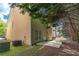 Home's exterior from the backyard featuring a concrete patio and grassy area at 2034 Reavis Blf, Conyers, GA 30012