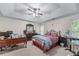 Spacious bedroom with ceiling fan and a desk area at 2034 Reavis Blf, Conyers, GA 30012