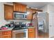 Updated kitchen featuring stainless steel appliances, wooden cabinets and hard surface counter tops at 2034 Reavis Blf, Conyers, GA 30012