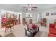 Spacious living room with an open floor plan and seamless transition to the dining area at 2034 Reavis Blf, Conyers, GA 30012