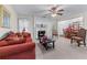 Cozy living room featuring a fireplace and an open view to the dining area at 2034 Reavis Blf, Conyers, GA 30012