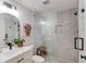 Stylish bathroom showcasing a glass-enclosed shower with decorative tile and modern fixtures at 2112 Ivey Chase Dr, Dacula, GA 30019