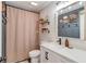 This bathroom features a ship lap wall, a framed mirror, a wooden shelf and wainscoting paneling at 2112 Ivey Chase Dr, Dacula, GA 30019
