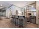 Stylish bar area features marble countertops and seating for four with stainless steel range at 101 Morgan Ln, Canton, GA 30115