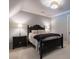 Bedroom with a dark wood bed set, neutral walls, and cozy carpet at 101 Morgan Ln, Canton, GA 30115