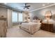 Comfortable bedroom featuring neutral colors, plantation shutters, and bedside tables at 101 Morgan Ln, Canton, GA 30115