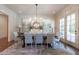 Elegant dining room offers stylish decor, natural light, and a spacious atmosphere at 101 Morgan Ln, Canton, GA 30115