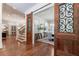 Welcoming foyer with hardwood floors, detailed trim, and view to the dining room at 101 Morgan Ln, Canton, GA 30115
