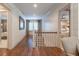 Bright hallway featuring wood floors and access to multiple rooms at 101 Morgan Ln, Canton, GA 30115