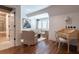 Inviting living room area featuring a sitting area and built-in desk at 101 Morgan Ln, Canton, GA 30115