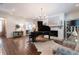 Comfortable living room with a fireplace, piano, and elegant furnishings, perfect for relaxation at 101 Morgan Ln, Canton, GA 30115