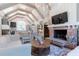Bright living room featuring a brick fireplace, vaulted ceilings and open floorplan to the kitchen at 101 Morgan Ln, Canton, GA 30115