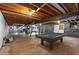 Unfinished basement offering exposed beams, concrete floor, a pool table, and potential for customization at 1901 Trophy Dr, Marietta, GA 30062