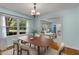 Light-filled dining room with wood floors and easy access to the living room at 1901 Trophy Dr, Marietta, GA 30062