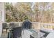 Outdoor deck area, complete with patio furniture and gas grill at 2123 Indian Ivey Ln, Dacula, GA 30019