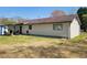 Expansive backyard features a well-maintained lawn, offering ample space for outdoor activities and enjoyment at 6071 Deerfield Ct, Morrow, GA 30260
