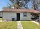 Expansive backyard featuring lush lawn, storage shed, and additional features at 6071 Deerfield Ct, Morrow, GA 30260