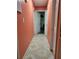Hallway featuring tile flooring with decorative patterns and a view to other rooms at 6071 Deerfield Ct, Morrow, GA 30260