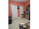 Living room with tile flooring and two closets/storage areas at 6071 Deerfield Ct, Morrow, GA 30260