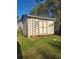 Outdoor shed provides extra storage, complemented by a ladder for easy maintenance at 6071 Deerfield Ct, Morrow, GA 30260