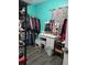 Functional walk-in closet includes a built-in vanity and ample storage at 6071 Deerfield Ct, Morrow, GA 30260