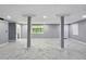 Unfinished basement with tiled floor, recessed lighting and columns at 3918 Artist Vw, Decatur, GA 30034