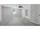 Spacious bedroom with light gray carpeting and a ceiling fan for added comfort at 3918 Artist Vw, Decatur, GA 30034