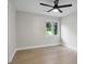 Bedroom featuring light hardwood floors, a ceiling fan, and bright natural light at 3918 Artist Vw, Decatur, GA 30034